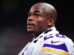 Minnesota Vikings running back Adrian Peterson looks on in the second half against the St. Louis Rams during their NFL football game in St. Louis, Missouri, in this September 7, 2014 file photo. (Jeff Curry/ USA TODAY Sports)
