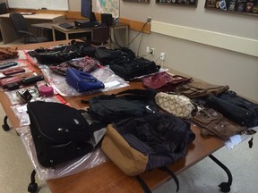 Items allegedly stolen from dozens of cars on display at Toronto Police 33 Division Wednesday, Sept. 17, 2014. (Chris Doucette/Toronto Sun)