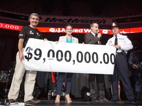 Andrew Lockie, CEO of United Way of London-Middlesex, Erin Craven-Patrick, director of marketing and sales at 3M, emcee Sean Irvine and police chief Brad Duncan roll out the goal of the United Way's 2014 fund raising campaign during Harvest Lunch at Budweiser Gardens in London, Ontario on Wednesday, September 17, 2014. (DEREK RUTTAN, The London Free Press)