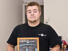 Jason Michaud owner of Tech Galaxy poses in his new store, which is located at 96 6th Avenue in Cochrane.