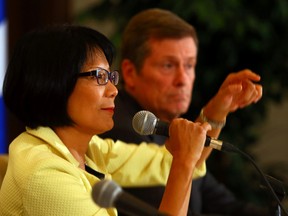 Mayoral candidates John Tory and Olivia Chow face off in a debate at the National Club in Toronto on Wednesday, September 17, 2014. (Dave Abel/Toronto Sun)