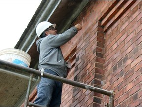 Shawn Taylor from RMS Masonry Service works at repointing brickwork on the Main Entrance and Artifacts building at the Elgin County Railway Museum.

Contributed photo