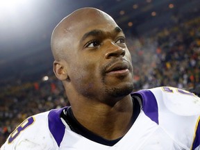 The mother of embattled Vikings running back Adrian Peterson is supporting her son through his child abuse allegations. (Tom Lynn/Reuters/Files)