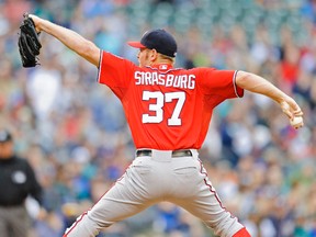 Washington Nationals starting pitcher Stephen Strasburg pitches to the Seattle Mariners during the first inning at Safeco Field on August 30, 2014. (Steven Bisig/USA TODAY Sports)
