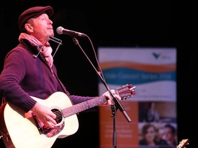 Gino Donato/The Sudbury Star
Despite the cold rainy weather hundreds of Sudburians turned out for the final installment of the 2014 Vale Concert Series featuring legendary Canadian  rocker Barney Bentall last night. In its third year, the Vale Concert Series supports the Sudbury Food Bank.