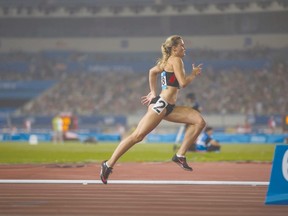 Lexi Aitken from Clinton competing in the women’s 400-meter hurdles at the 2014 Summer Youth Olympic Games in Nanjing, China last month.