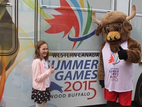 Gabrielle Dubuc, left, poses with games mascot Mistiko, right, back in May during the unveiling of the 2015 Western Canada Summer Games countdown clock.ROBERT MURRAY/FILE PHOTO