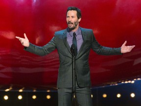 Actor Keanu Reeves speaks on stage at the eighth annual Spike TV's "Guys Choice" awards in Culver City, California June 7, 2014. REUTERS/Mario Anzuoni