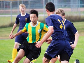 ENSS (blue shirts) opened the boys soccer season with a doubleheader sweep at Centennial this week. (Submitted photo)