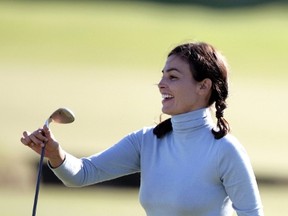 Spanish model Ines Sastre holds her club on the first green on the second round of the Alfred Dunhill Links Championship at St Andrew's Old Course, Scotland, Oct. 5, 2007. The Royal and Ancient Golf Club of St Andrews on Thursday voted to allow women members for the first time in its 260-year history. (KIERNAN DODDS/AFP)