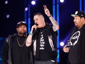 A Tribe Called Red accepts the Juno Award for Breakthrough Group of the Year at the 2014 Juno Awards in Winnipeg on March 30, 2014. (REUTERS/Trevor Hagan)