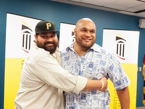 Chris Kemoeatu (left) and brother Ma'ake celebrate their successful kidney transplant surgeries Wednesday. (University of Maryland Medical Center)