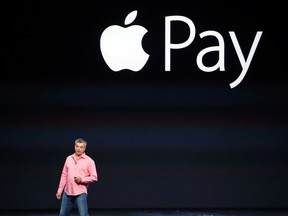 Eddy Cue, Apple's senior vice president of Internet Software and Service, introduces Apple Pay during an Apple event at the Flint Center in Cupertino, Califo., September 9, 2014. REUTERS/Stephen Lam