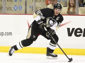 Sidney Crosby #87 of the Pittsburgh Penguins handles the puck against the Columbus Blue Jackets in Game One of the First Round of the 2014 NHL Stanley Cup Playoffs. (Justin K. Aller/Getty Images/AFP)