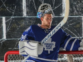 Maple Leafs goaltender James Reimer requested a trade in the off-season, but instead re-signed for two years with the club. (Dave Thomas/Toronto Sun)