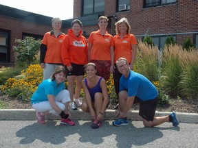 St. Thomas Mayor Heather Jackson, front left, laces up her shoes at St. Thomas Elgin General Hospital ahead of the inaugural Railway City Road Races fundraiser. Proceeds from the event go to STEGH's orthopedic program. With Jackson are STEGH safety officer Kristy Cork and occupational health worker Adam Wusek. Back row: Corinne Roos, Dawn Ellis, Nancy Lawrence and Carolyn Johnson.