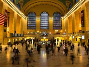 Travelers and commuters walk through Grand Central Station in New York November 27, 2013. 
REUTERS/Eric Thayer