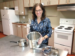 Public health dietician Ann Armstrong stands in the kitchen at the health unit, which will be holding a series of classes promoting better cooking skills, such as shopping for and preparing more healthy meals. FRI., SEPT. 19, 2014 KINGSTON, ONT. MICHAEL LEA\THE WHIG STANDARD\QMI AGENCY