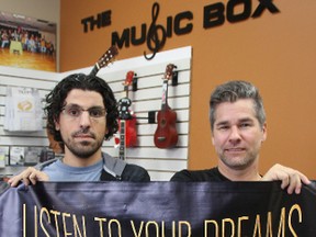 Mike McKyes, former guitarist with The Joys, is moving his Camlachie-based recording studio The Grove Productions to The Music Box in Sarnia next month. McKyes, right, is hoping to open the new studio space in Roberto Gismondi's shop by Oct. 1. (TYLER KULA, The Observer)