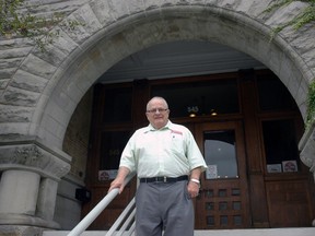 Ald. Gord Campbell stands on the steps of St. Thomas city hall. Campbell is retiring this year after 29 years on city council. (Ben Forrest, Times-Journal)