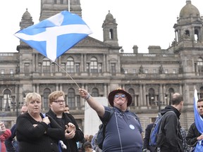 Pro Union, and Independent Supporters in St.George Square the day after Scotland voted "No" for independence in a 55% over 45% majority.

WENN