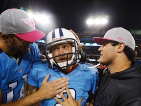 Former Tennessee Titans kicker Rob Bironas (middle) was killed in a single-vehicle crash Sept. 20. (Reuters)