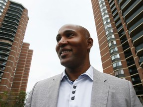 Andray Domise goes door to door in Ward 2 in Etobicoke. He is running for city councillor against Rob Ford. (Stan Behal/Toronto Sun)