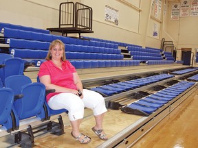 Tracy Inaba is the new principal at County Central High School. Here, she takes a seat after showing the Advocate the newly installed bleachers at the Cultural-Recreational Centre.