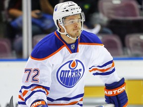 Edmonton Oilers Greg Chase against the Vancouver Canucks during the 2014 Young Stars Classic Tournament in Penticton September 12, 2014. Al Charest/Calgary Sun/QMI Agency