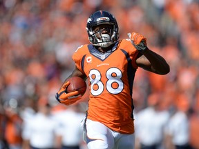 Denver Broncos wide receiver Demaryius Thomas runs after a reception against the Kansas City Chiefs at Sports Authority Field at Mile High on September 14, 2014. (Ron Chenoy/USA TODAY Sports)