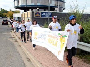 Participants in Kenora’s first annual Bladder Cancer Awareness Walk leave the Lakeside Best Western on Sunday morning, Sept. 21, to walk to McLeod Park and back. See story on page 3.