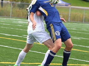 Gino Donato/The Sudbury Star
Matthew Wilkes of the Laurentian Voyageurs controls the ball against Nathan Larsen of Trent Excalibur during OUA soccer action from James Jerome Field on Sunday.