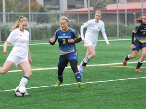 Keith Dempsey/For The Sudbury Star
Voyageurs' Allison Pilon gets in the way of a Trent player during OUA action at James Jerome Sports Complex on Sunday. The Voyageurs won 1-0, their first win at home this season.