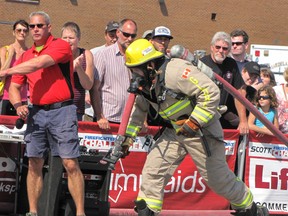 Ian VanReenen, a firefighter from Point Edward, competed in the Combat Challenge, a professional firefighters’ competition that was added to this year’s FireFest in downtown Chatham.