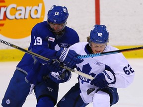 Joffrey Lupul and William Nylander battle for the puck during Leafs training camp at the Mastercard Centre on Sept. 22, 2014. (DAVE ABEL/Toronto Sun)