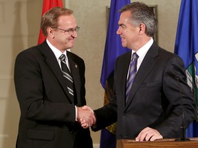 Alberta Premier Jim Prentice announced the appointment of Rob Merrifield (left) as Senior Representative to the United States and Ron Hoffman (not pictured) as Alberta's Senior Representative for Asia Pacific, during a press conference at Government House in Edmonton Alta., on Wednesday Sept. 17, 2014.