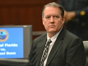 Defendant Michael Dunn looks back at his family on day two of his first-degree murder trial in Jacksonville, Florida, in this file photo taken February 7, 2014. (REUTERS/Bob Mack/The Florida Times-Union/Files)