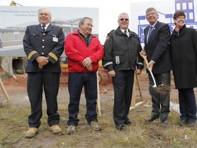 From left to right Dan Bakker, Division 6 division commander, councillor Terry Shortt, fire chief Scott Manlow, Mayor Peter Mertens and Susan Turnbull, commissioner of corporate services and finance, celebrate the construction of the new Consecon fire station, Monday, Sept. 22, 2014. - Emily Mountney-Lessard/County Weekly News/QMI Agency