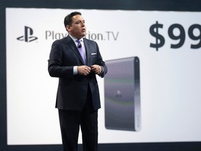 Shawn Layden, president and CEO of Sony Computer Entertainment America, presents the PlayStation TV during a media briefing before the opening day of the Electronic Entertainment Expo, or E3, at the Memorial Sports Arena in Los Angeles, June 9, 2014.  REUTERS/Mario Anzuoni