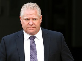 Doug Ford arrives at Mount Sinai Hospital on Thursday September 18, 2014. (Craig Robertson/Toronto Sun)