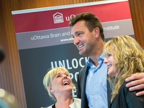 Olympic figure skating silver medalist Elizabeth Manley with Stéphane Richer, former right winger for the Montreal Canadiens, and Shelley McKay, former Canadian national team athlete, speak at the University of Ottawa for Brain Health Awareness Week Monday, Sept. 22, 2014.
DANI-ELLE DUBE/OTTAWA SUN/QMI AGENCY