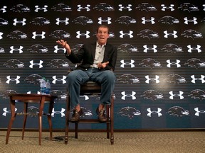 OWINGS MILLS, MD - SEPTEMBER 22: Baltimore Ravens owner Steve Bisciotti speaks with the media at the team's practice facility in Owings Mills, Md., Sept. 22, 2014. (ROB CARR/Getty Images/AFP)