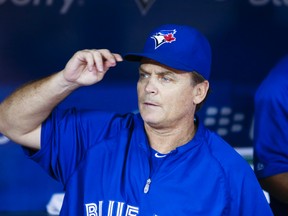 If GM Alex Anthopoulos is back next season, manager John Gibbons will be as well. (Doroszuk/Toronto Sun/QMI Agency)