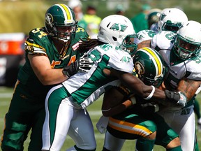 The Eskimos and Roughriders will be battling for second place and a chance at a home playoff game when they meet Friday. (Ian Kucerak, Edmonton Sun)