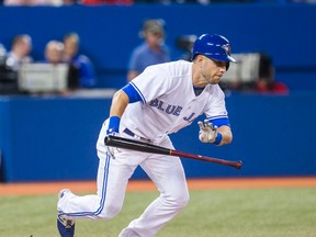 Jays batter Steve Tolleson takes off for first during third inning action against the Mariners in Toronto on Monday, Sept. 22, 2014. (Ernest Doroszuk/QMI Agency)