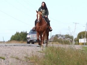 Gino Donato/The Sudbury Star
Carina Lamontagne rides her horse Stetson in Azilda on Monday afternoon. The weather for the rest of the week calls for sunny skies and temperatures in the mid-20s.