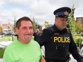 Boris Panovski is walked into the Goderich courthouse for a bail hearing on Monday September 22, 2014. (Mike Hensen/QMI Agency)