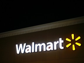 A view shows the Walmart logo at a Walmart store in North Bergan, N.J., in this November 22, 2012 file photo. (REUTERS/Eric Thayer/Files)