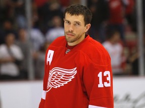 Detroit Red Wings centre Pavel Datsyuk stands on the ice before the start of their NHL pre-season game against the Toronto Maple Leafs in Detroit on September 27, 2013. (REUTERS/Rebecca Cook)