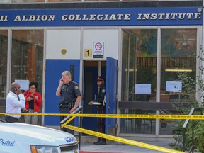 Police at North Albion Collegiate on Kipling Ave. in Toronto on Tuesday, September 23, 2014, after a student was stabbed to death. (Dave Thomas/Toronto Sun)